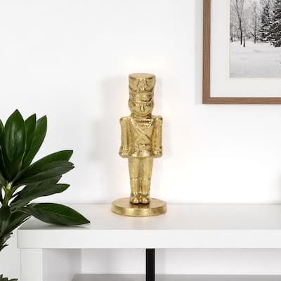 HomeRoots 7" Gold Cast Iron Christmas Nutcracker Figurine - 2.75 in. x 7.00 in. x 2.75 in.