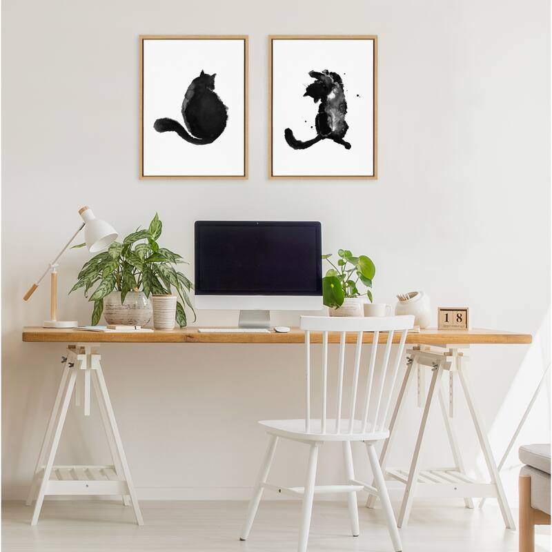 Kate and Laurel Sylvie Playful Cat BW Framed Canvas by Viola Kreczmer