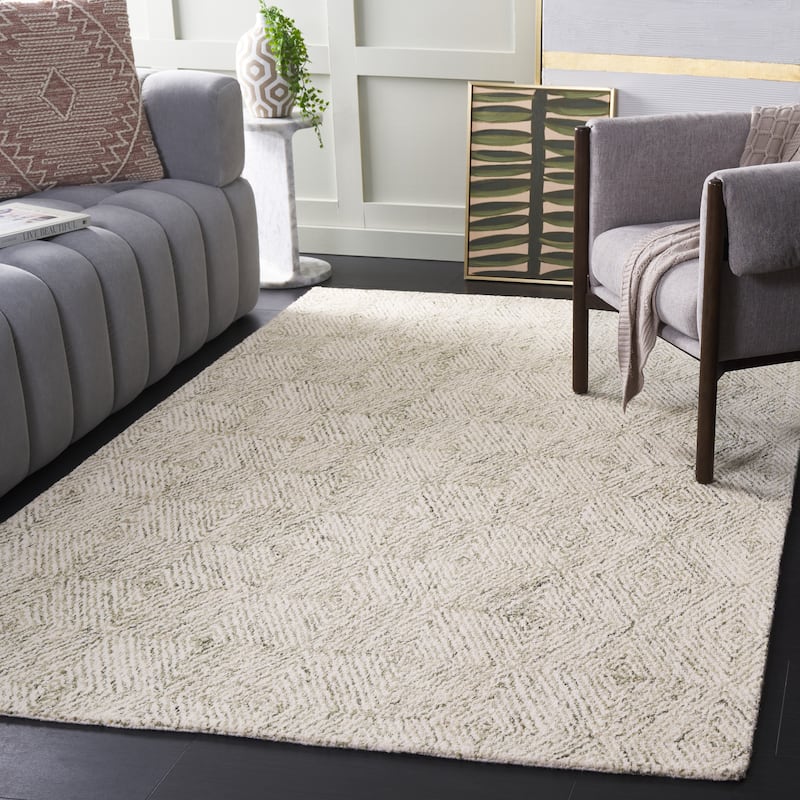 SAFAVIEH Handmade Ebony Herlaug Modern Wool Rug - 8' x 10' - Light Green/Ivory