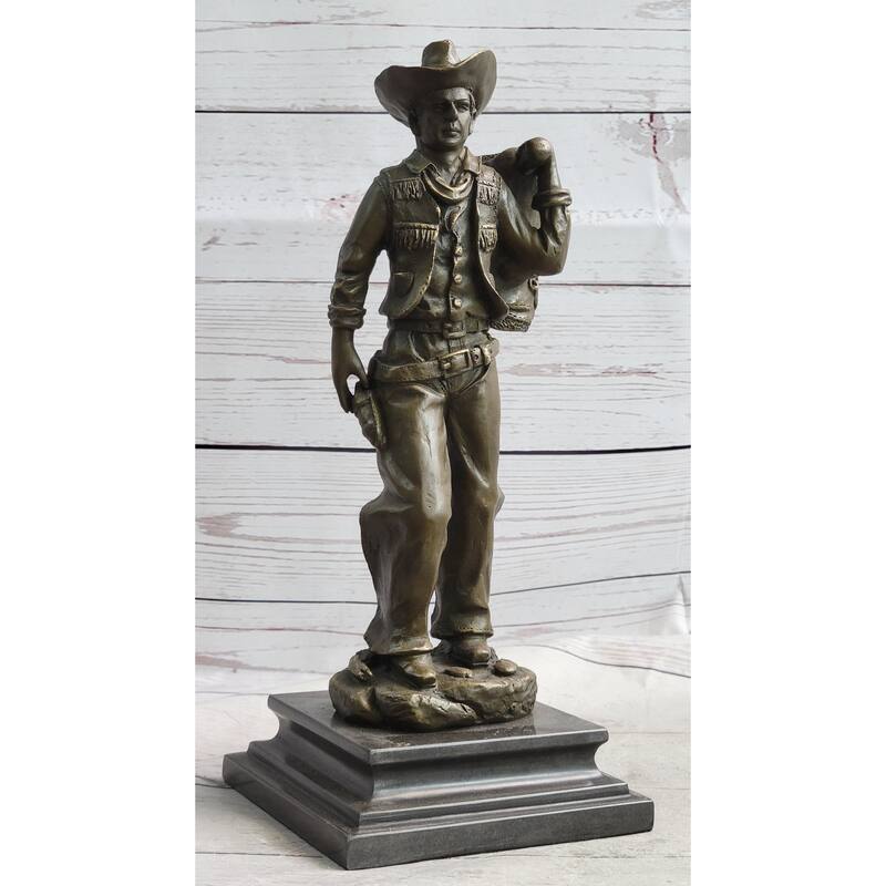 Country Western Cowboy In Chaps Carrying Imitative Horse Saddle Bronze Statue Sculpture Figure 12 Inches X 4 Inches