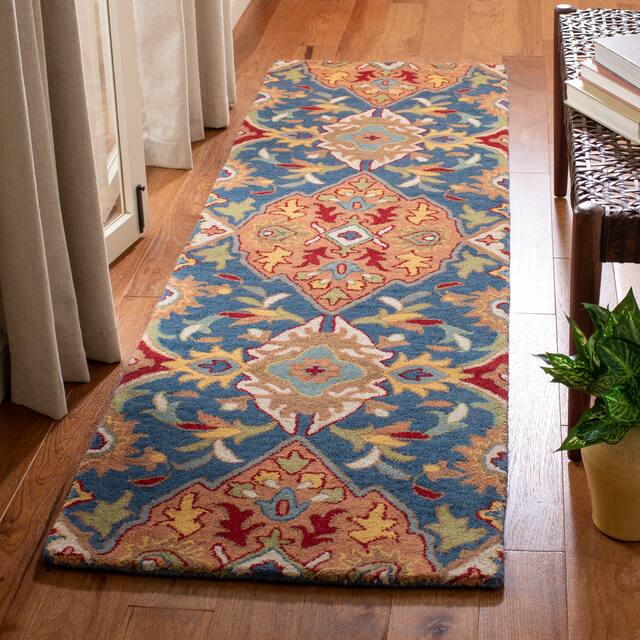 SAFAVIEH Heritage Oriental Hand-tufted Wool Area Rug - 2'3" x 8' Runner - Camel/Blue
