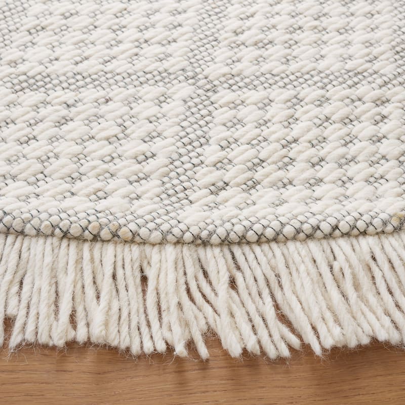 SAFAVIEH Handmade Natura Elgin Wool Fringe Rug
