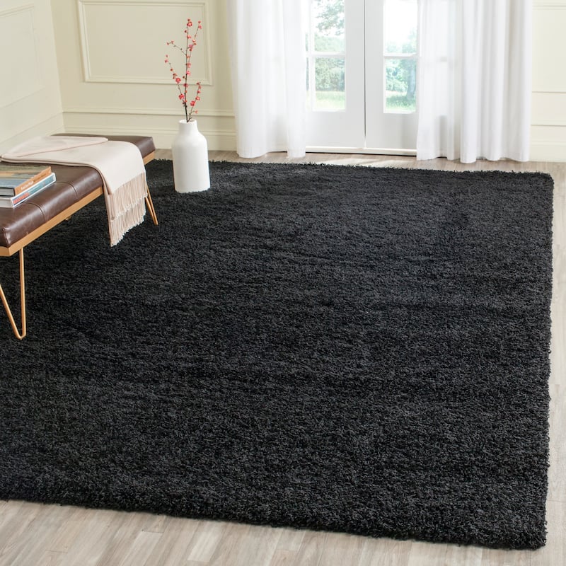 SAFAVIEH Laguna Shag Verdiana Solid Color 2-inch Thick Rug.