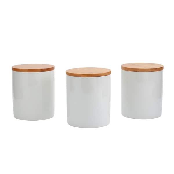 https://ak1.ostkcdn.com/images/products/is/images/direct/4e77919db634ea01e811b6d997f222fbc6a2bb29/Set-of-3-Bamboo-%26-Ceramic-Canister-Set.jpg?impolicy=medium