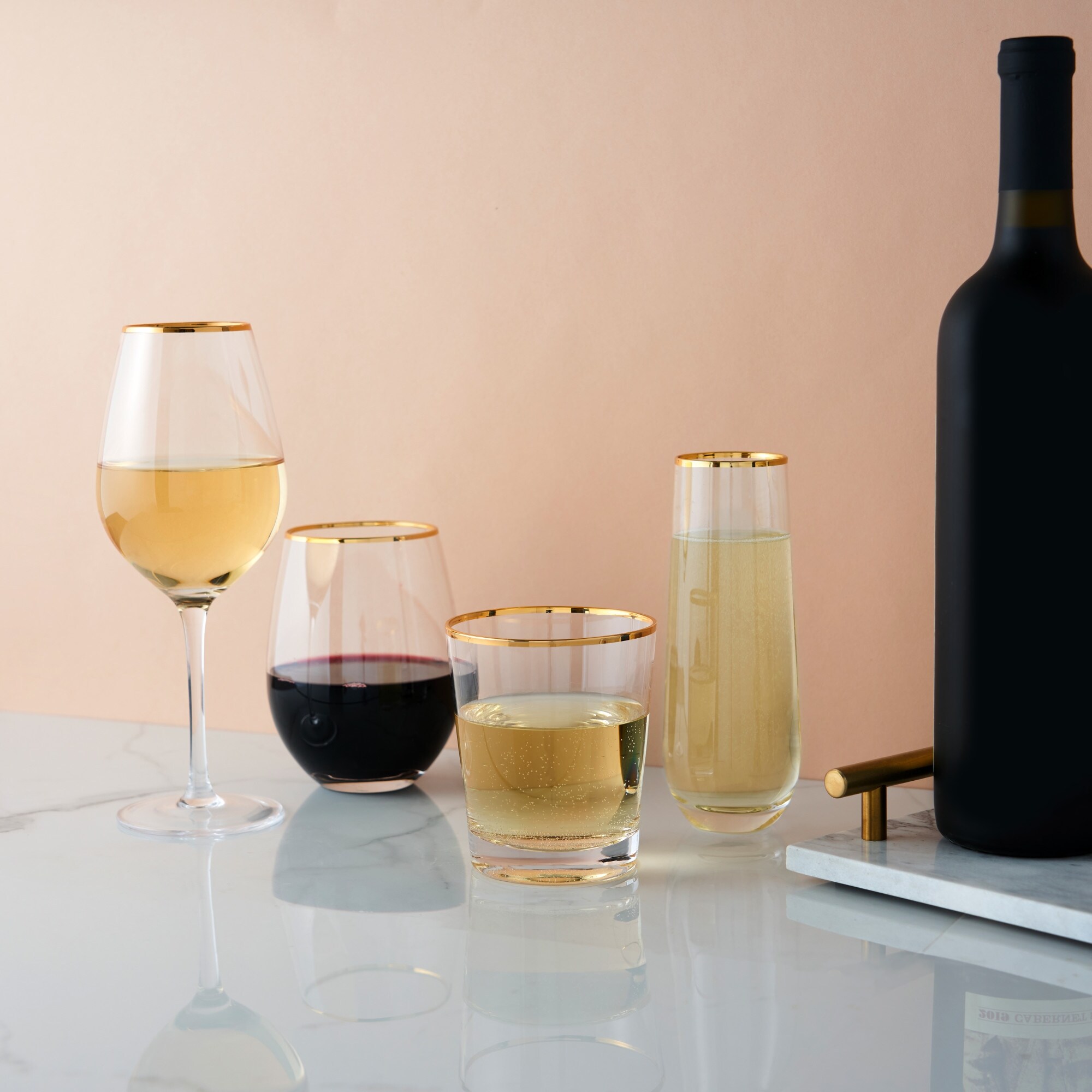 https://ak1.ostkcdn.com/images/products/is/images/direct/4e87d71cacd6160ef513a3580e8a8e92d0a21391/Gilded-Stemless-Wine-Glass-Set-by-Twine.jpg
