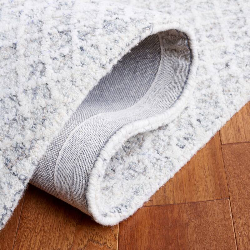 SAFAVIEH, Handmade Ebony Juozapa Modern Wool Rug