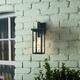 1-Light outdoor wall light with black finish and clear glass shade