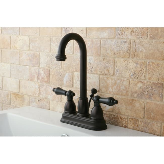 Kingston Brass Restoration Centerset Bathroom Faucet with Pop-Up Drain