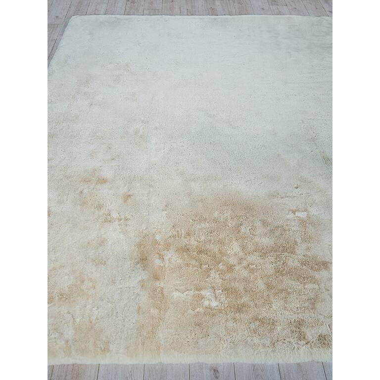 EXQUISITE RUGS Hand-stitched Polyacrylic Beige Area Rug.