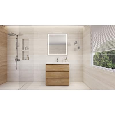 Angeles 36" freestanding bath vanity with single basin reinforced acrylic top.