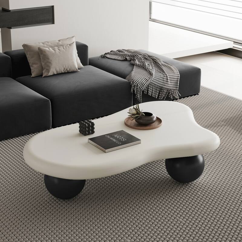 47 Inch Cloud Shaped Coffee Table with 3 Ball Legs