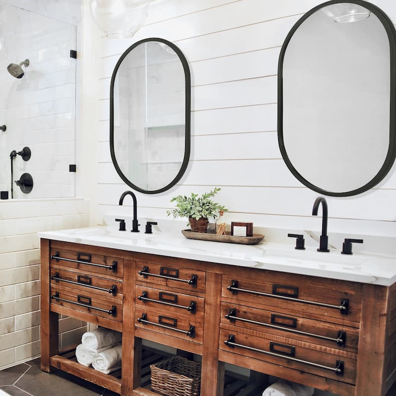 Copper Grove Elongated Oval Matte Black Wall Mirror