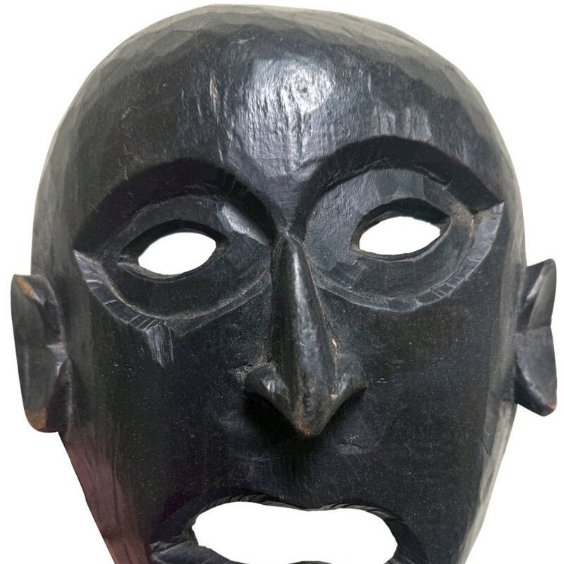 HomeRoots 11" Black Solid Wood Decorative Mask Tabletop Sculpture - 11" H