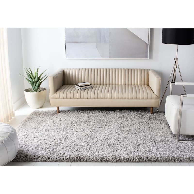 SAFAVIEH Handmade Ryann Shag Anneclaar Solid Polyester Rug
