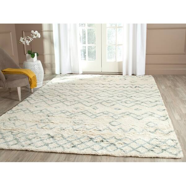 slide 2 of 22, SAFAVIEH Handmade Casablanca Shag Elenore Tribal Wool Rug 10' x 14' - Ivory/Blue