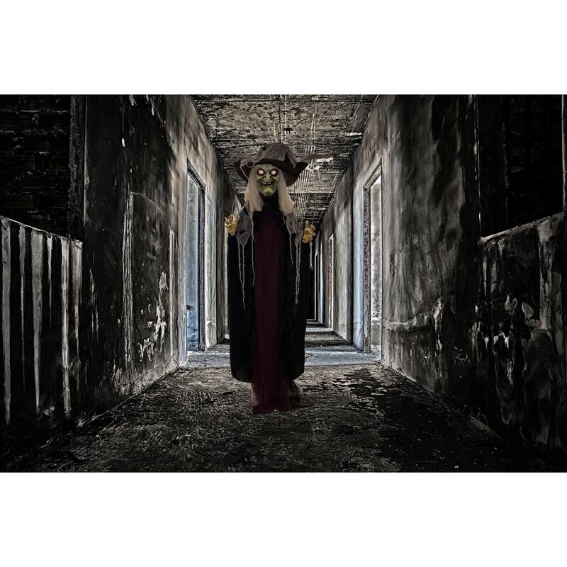 Haunted Hill Farm 6.9-ft. Standing Witch, Indoor/Covered Outdoor Halloween Decoration, LED Red Eyes, Poseable, Spinster