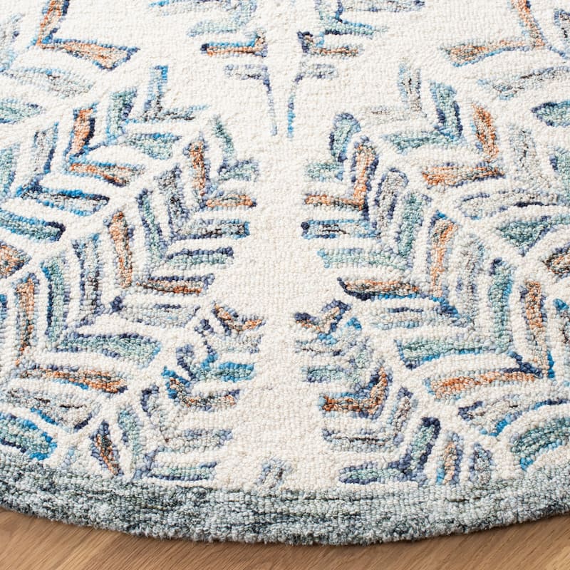 SAFAVIEH Handmade Capri Ilianka Wool Rug