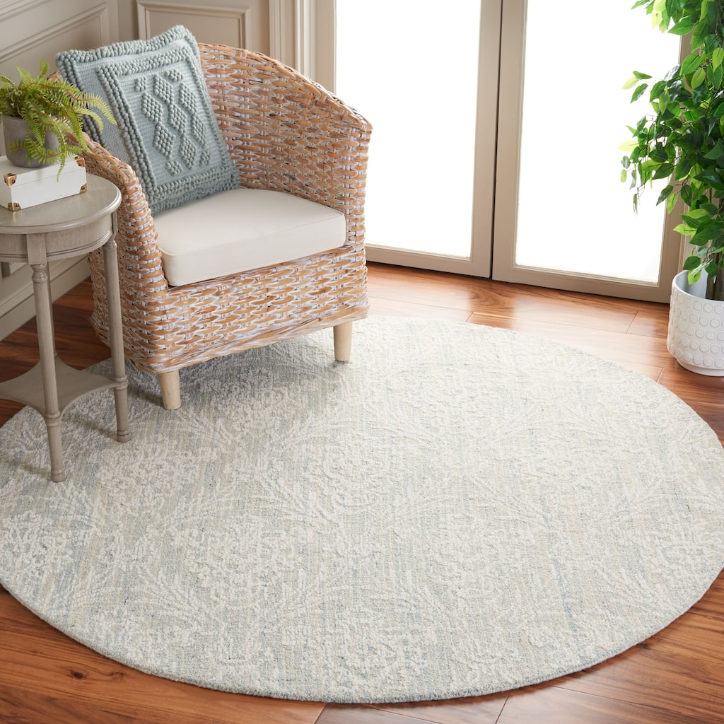 SAFAVIEH Handmade Ebony Fridbjorg Modern Wool Rug