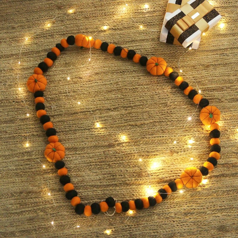 Novica Handmade Festive Pumpkin Wool Felt Garland - Orange