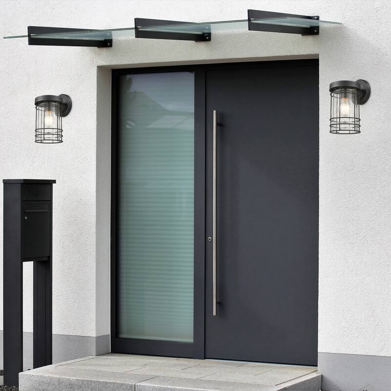 Textured Black 1- Light Outdoor Cylinder Wall Sconce with Seedy Glass