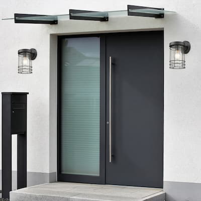 Textured Black 1- Light Outdoor Cylinder Wall Sconce with Seedy Glass
