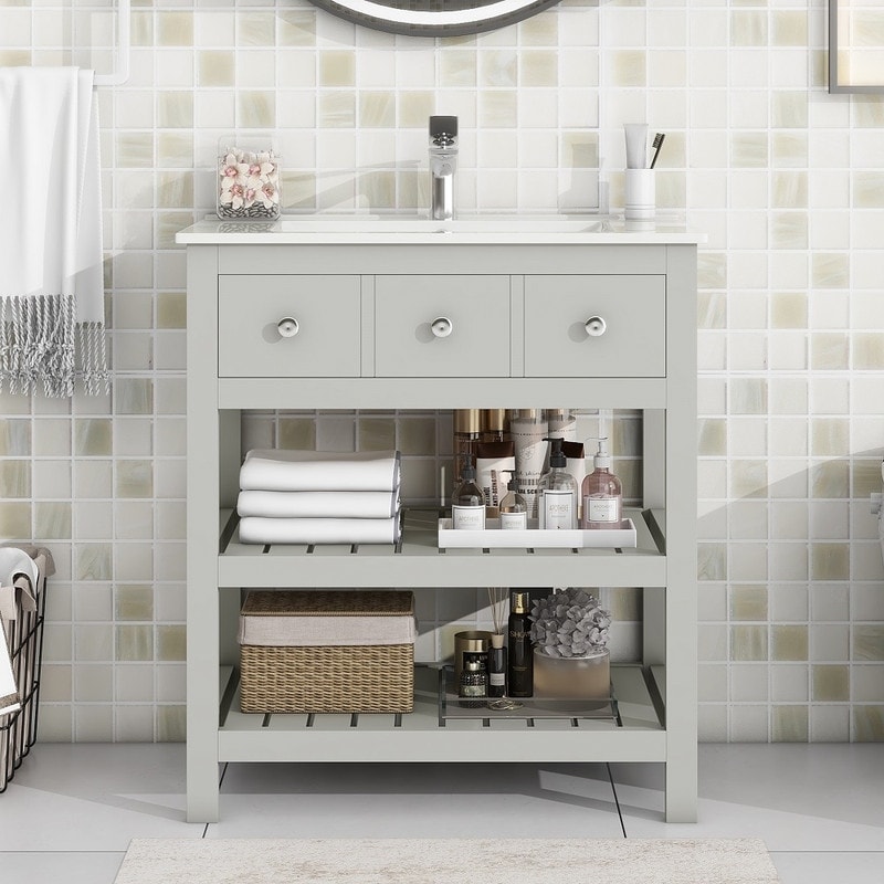 https://ak1.ostkcdn.com/images/products/is/images/direct/4fca6cb088f9d10e181b316538469d727f083ea6/30%27%27-Modern-Bathroom-Storage-Cabinet-with-2-Tier-Storage-Shelf-and-Single-Sink%2CGrey.jpg