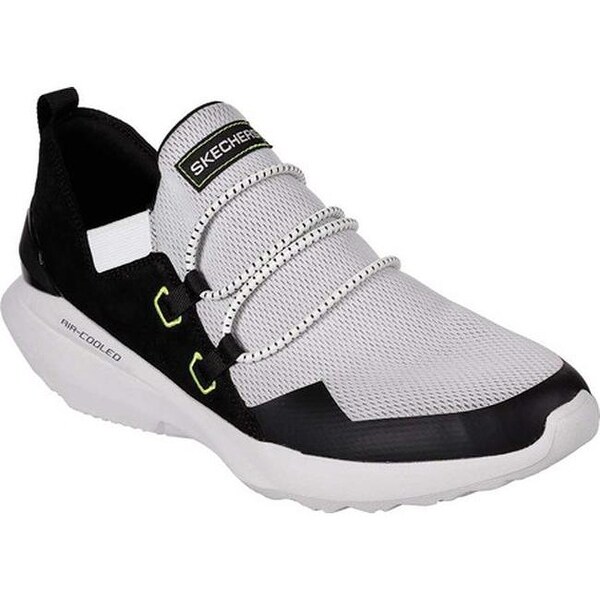 white and black skechers
