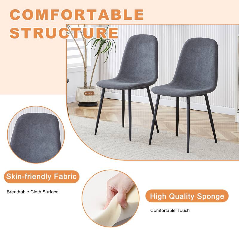 A Minimalist Retro Rectangular Dining Table And Black Metal Legs, Paired With Dark Gray Linen Fabric Chairs.