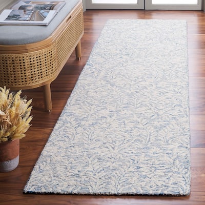 SAFAVIEH Hand-Tufted Ebony Melia Modern & Contemporary Wool Rug