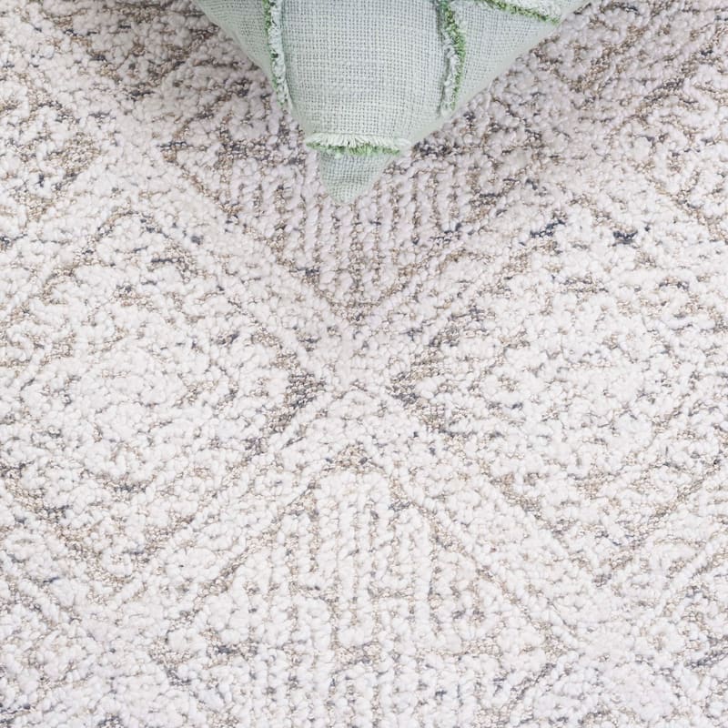 SAFAVIEH Handmade Ebony Kinue Wool Rug