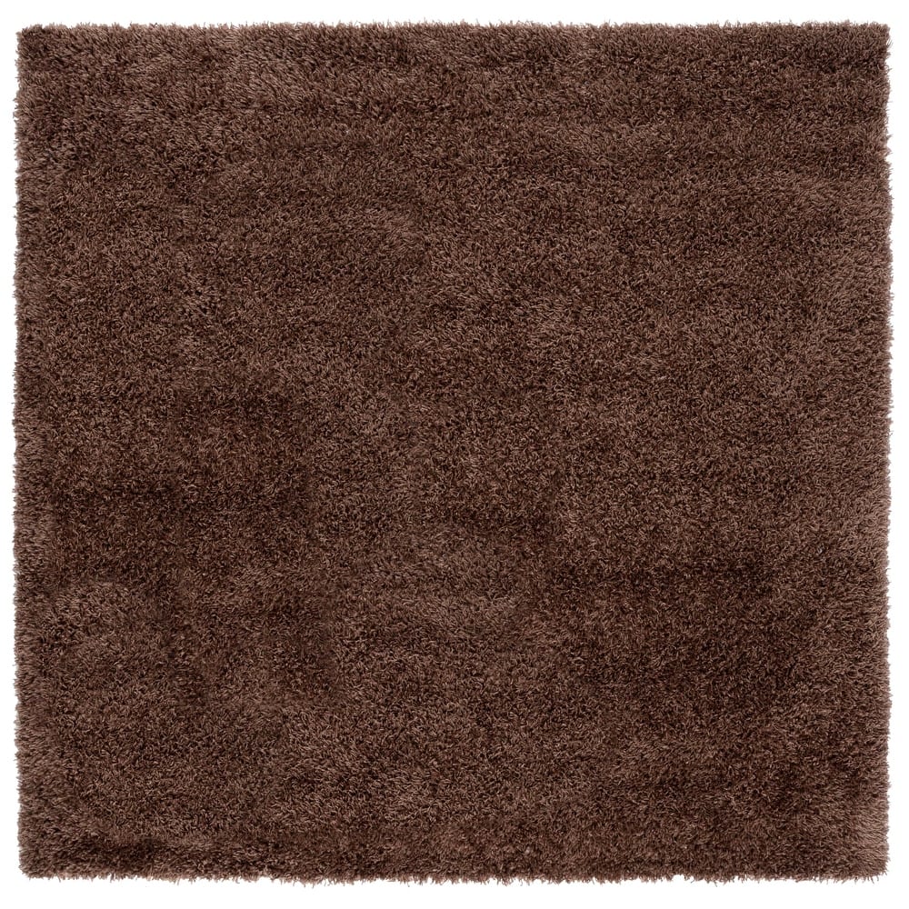 SAFAVIEH Handmade Rubi Shag Mevlide Solid Polyester Rug