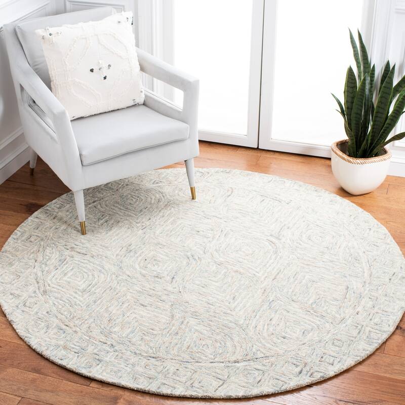 SAFAVIEH Handmade Ikat Saini Wool Rug - 6' Round - Beige/Grey