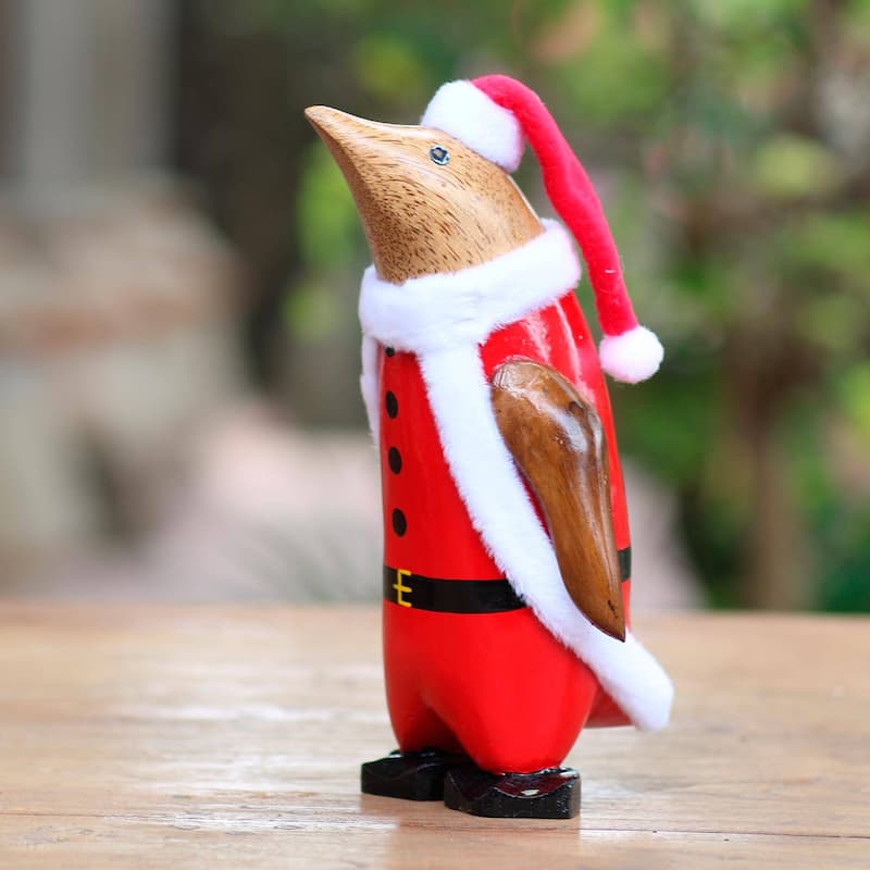 Wood statuette, 'Penguin Santa'