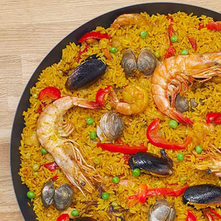 IMUSA Carbon Steel 6 in Paella Pan in Black with Red Handles