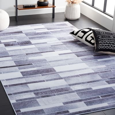SAFAVIEH Faux Hide Machine Washable Slip Resistant Erny Modern Abstract Rug