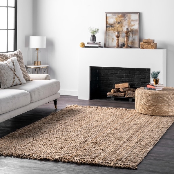 The Curated Nomad Saragossa Handmade Braided Jute Reversible Rug. Opens flyout.
