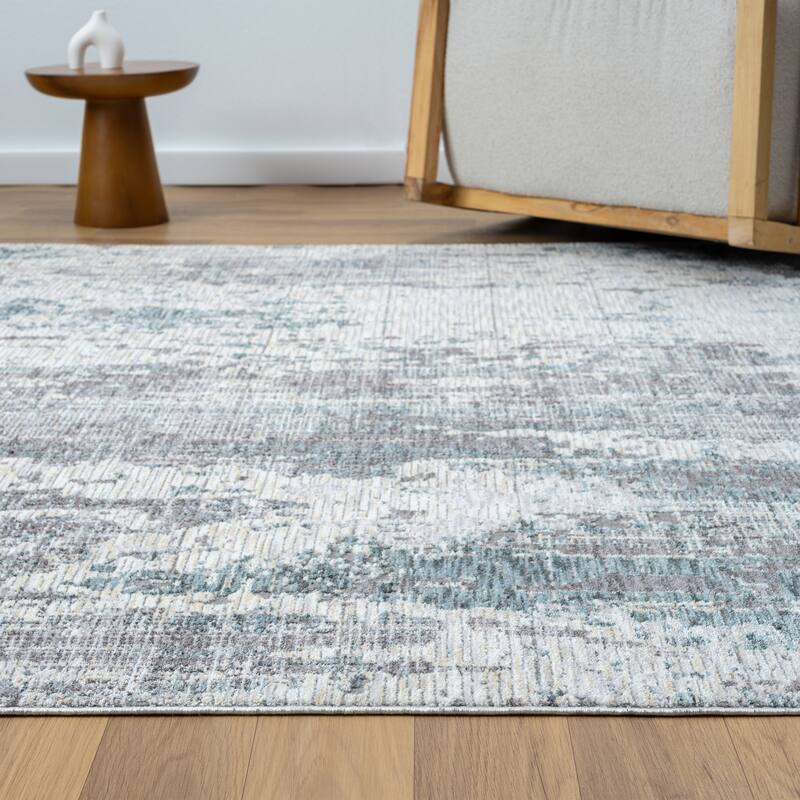 Reeves Modern Abstract Gray/Blue Performance Indoor Area Rug by Sevita