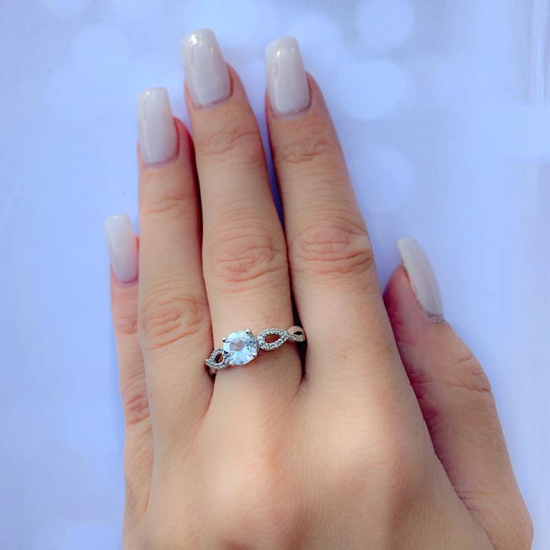 Miadora 10k White Gold Aquamarine and 1/10ct TDW Diamond Ring (G-H, I1-I2)