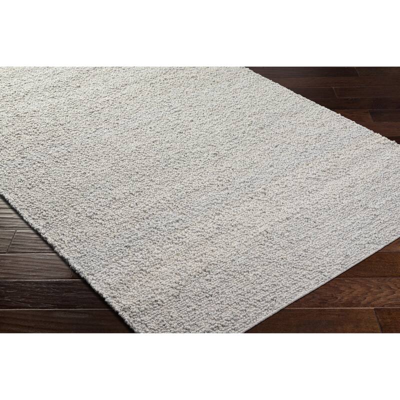 Juwan Mid-Century Modern Solid Area Rug
