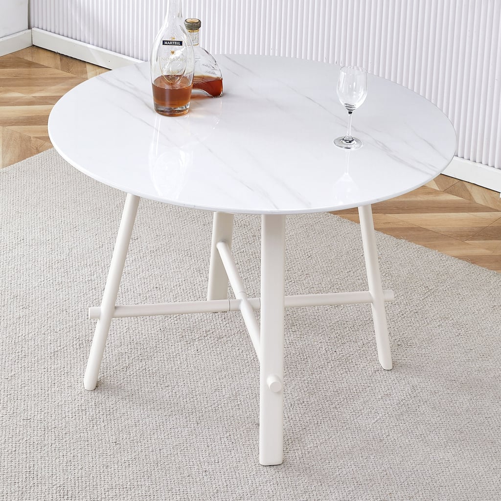 Modern Minimalist Circular Dining Table With A 42 Inch Diameter White Patterned Tabletop And White Metal Legs