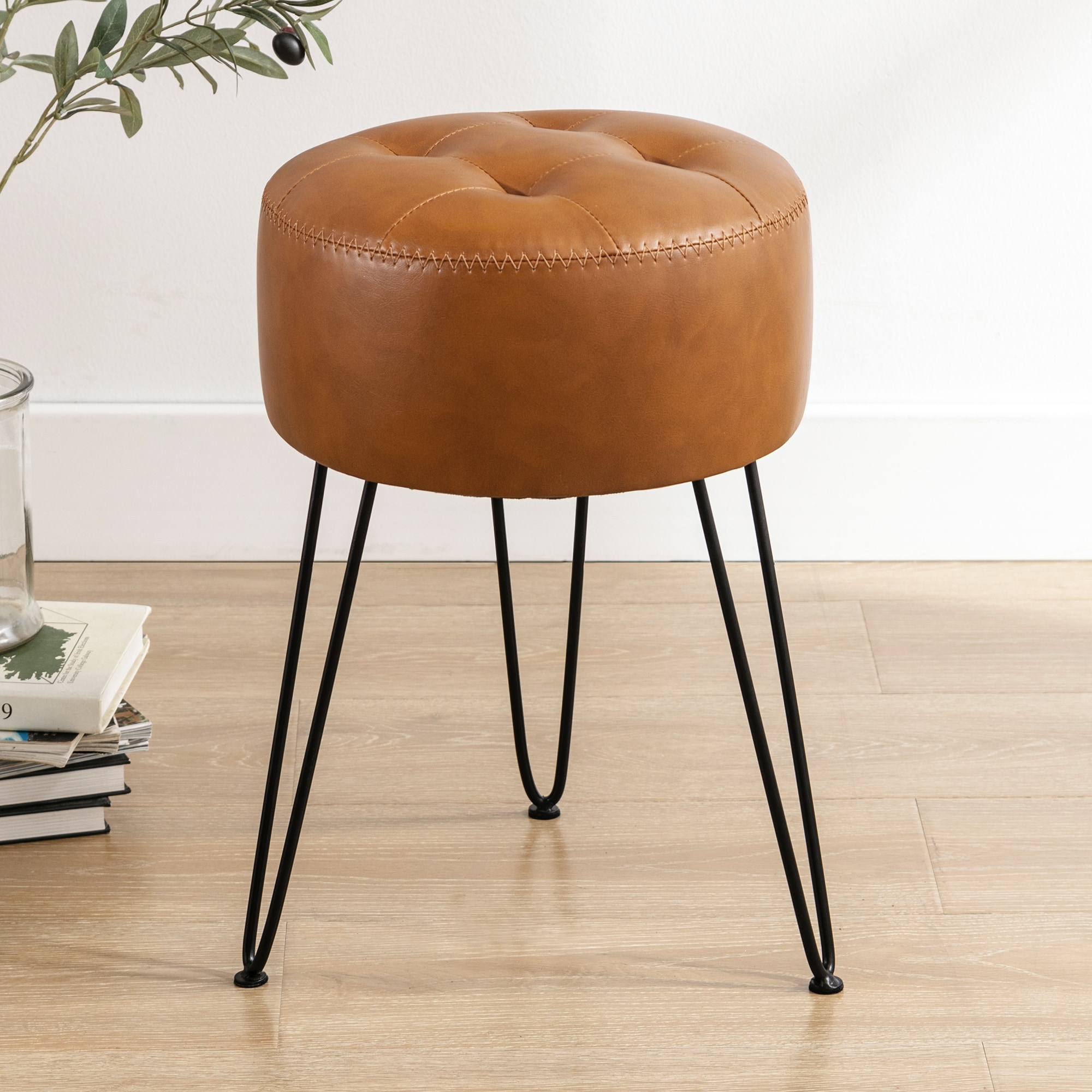 Leather ottoman hotsell metal legs