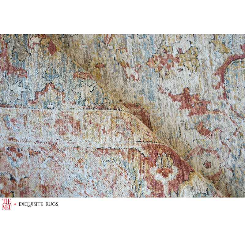 The Met X Exquisite Rugs Antique Loom Blue/Rust Area Rug.