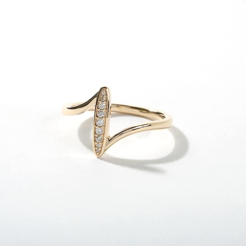 1/20ct TDW Diamond Bypass Fashion Ring in 10k Gold for Women