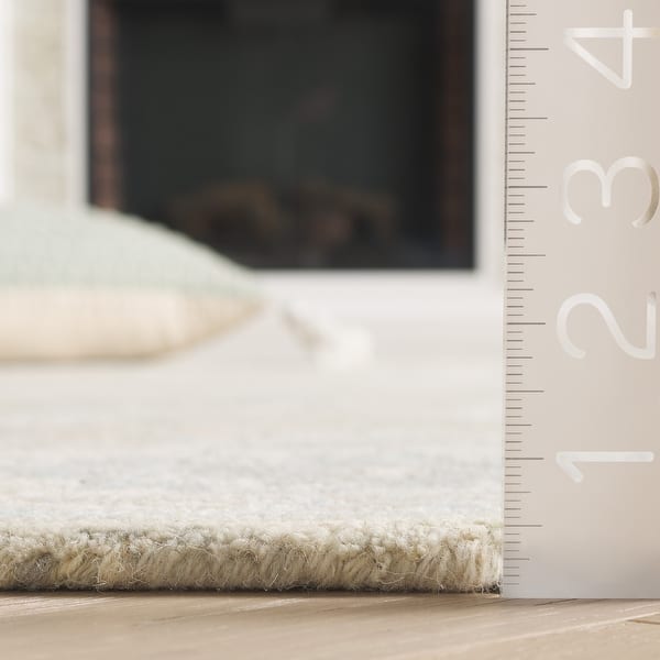 dimension image slide 0 of 3, SAFAVIEH Hand-Tufted Ebony Zhanat Modern & Contemporary Wool Rug