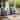 Gymojoy 4 - Person Outdoor Wicker Patio Set with 2 Swivel Glider Chairs, Side Table & 2 Ottomans, 6" Cushions