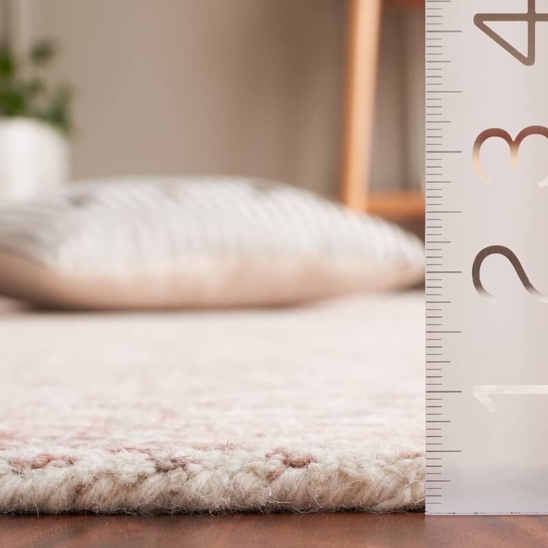 SAFAVIEH Handmade Ebony Herlaug Modern Wool Rug