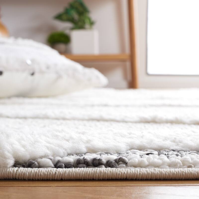 SAFAVIEH Moroccan Tassel Shag Sofika 2-inch Thick Rug