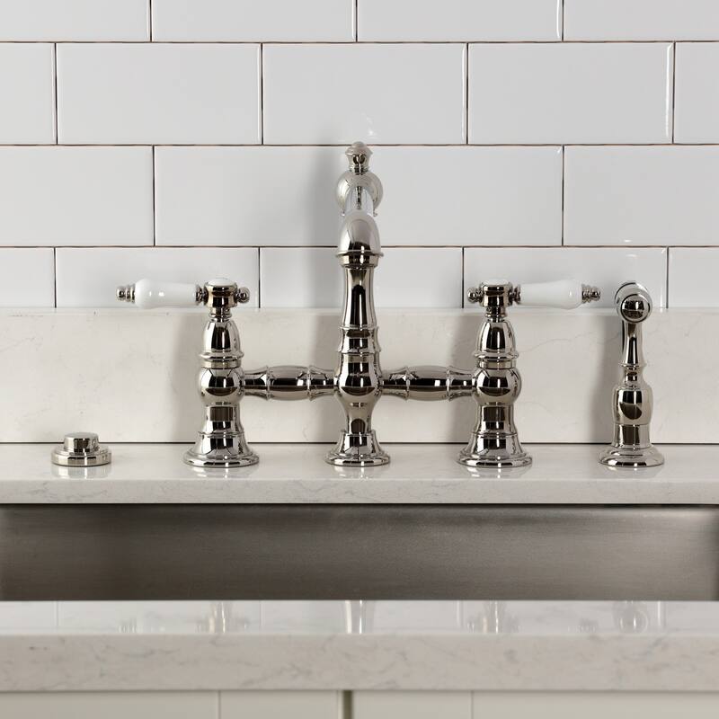 Kingston Brass Bel-Air Two-Handle 4-Hole Deck Mount Bridge Kitchen Faucet with Brass Side Sprayer
