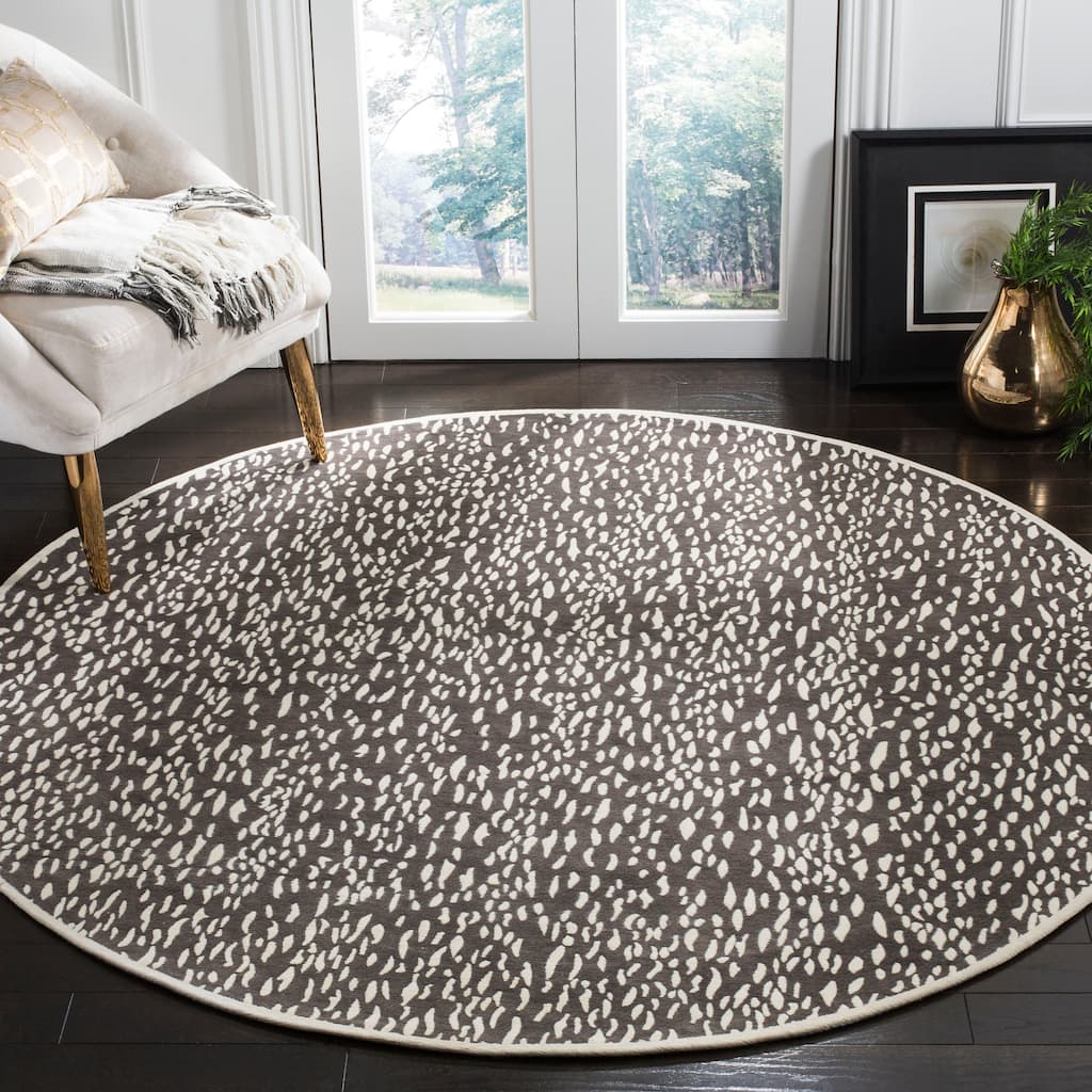 SAFAVIEH Handmade Marbella Goril Modern Polyester Rug