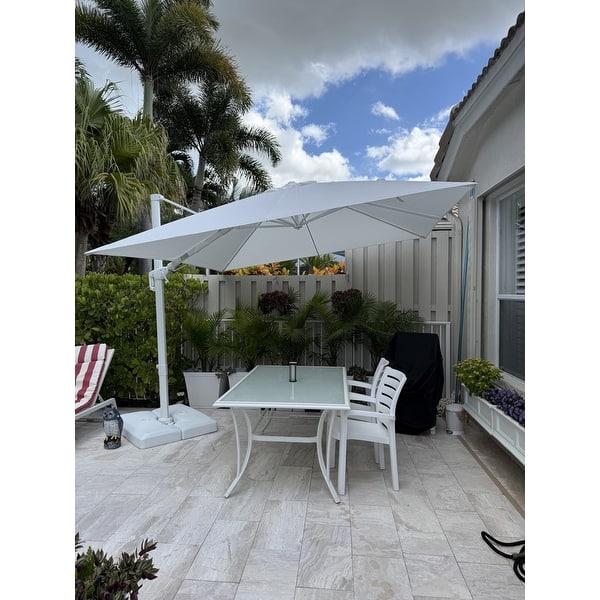 gray and white patio umbrella Safavieh 9 ft. Iris Fashion Line Black & Deluxe push lift system Fringe Patio Umbrella - Creamy